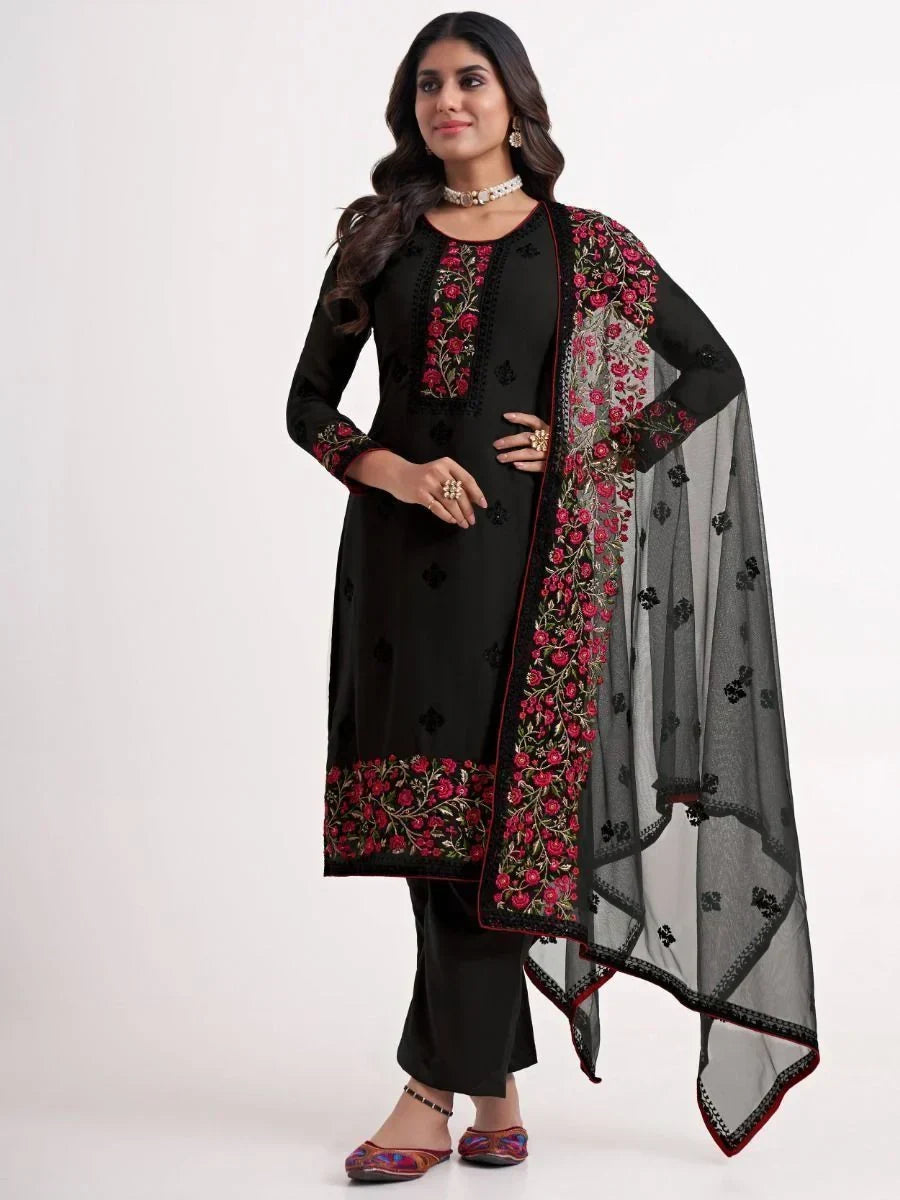 Woman wearing black embroidered salwar kameez with floral dupatta, ethnic Indian attire