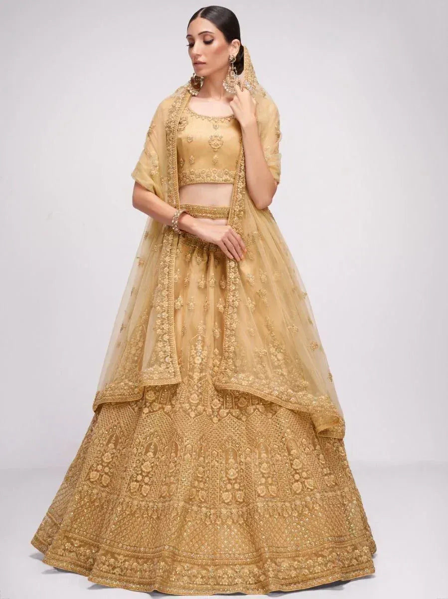 Golden embroidered lehenga choli with dupatta, Indian ethnic wear for weddings and festivals