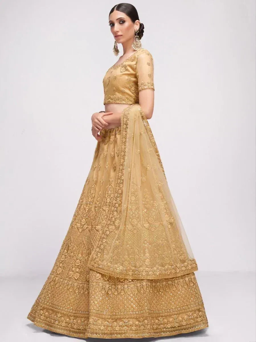Golden embroidered lehenga choli with net dupatta, Indian ethnic wear for weddings and festivals