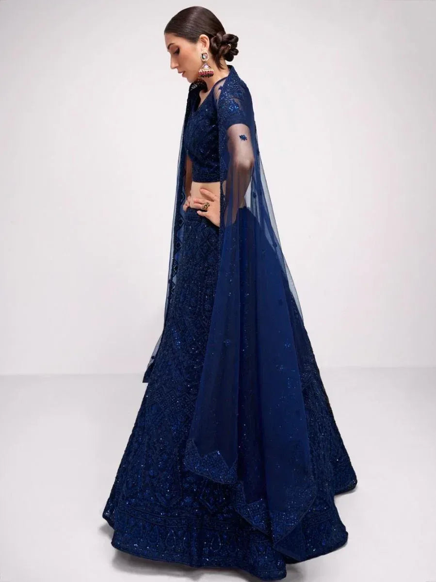 Navy blue designer lehenga choli with sequin embroidery and sheer dupatta, perfect for Indian ethnic wear
