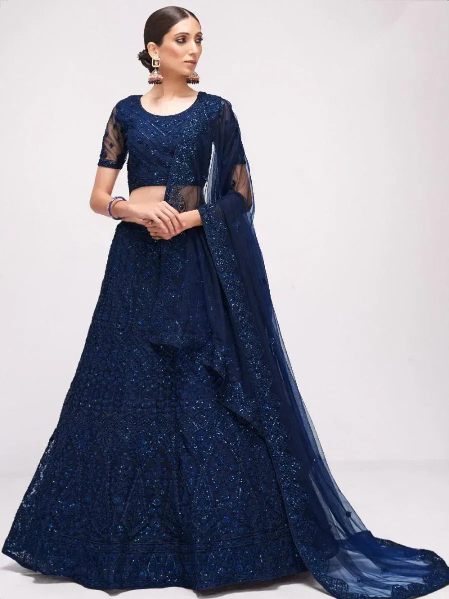 Navy blue embroidered lehenga choli with sheer sleeves and dupatta, perfect for Indian ethnic occasions
