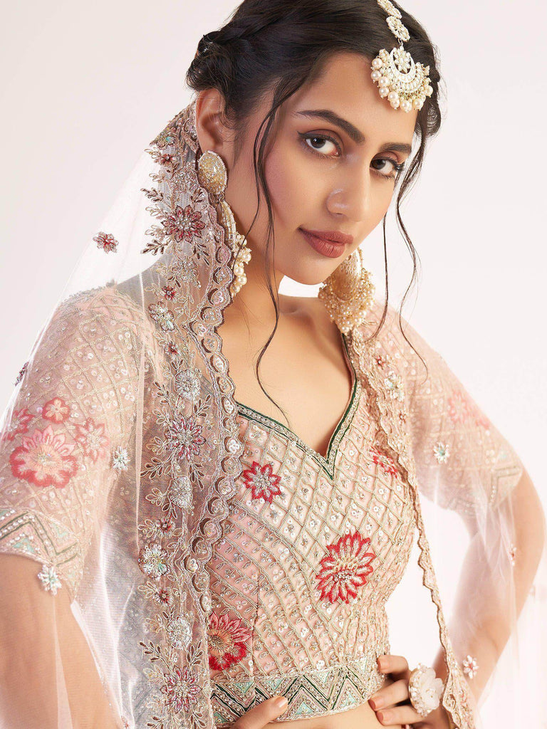 Excellent Peach Sequins Embroidered Net Wedding Wear Lehenga Choli