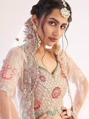 Excellent Peach Sequins Embroidered Net Wedding Wear Lehenga Choli