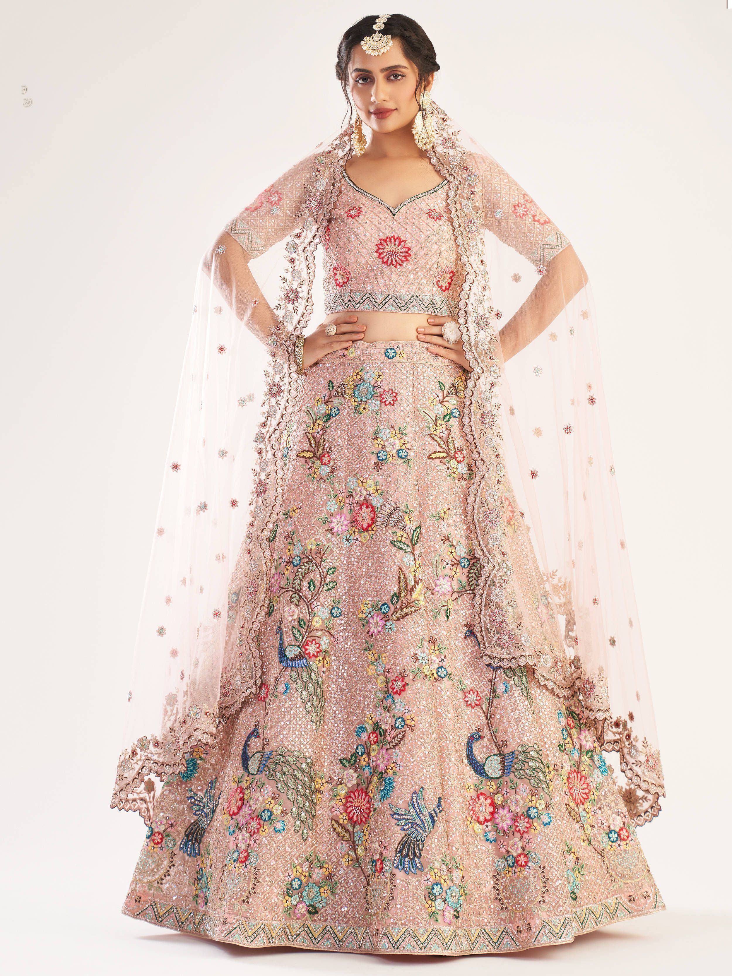 Pink floral embroidered lehenga choli with peacock motifs and sheer dupatta, Indian ethnic wear