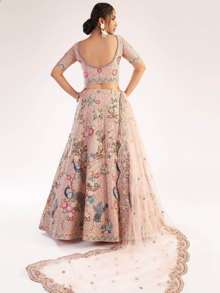 Excellent Peach Sequins Embroidered Net Wedding Wear Lehenga Choli