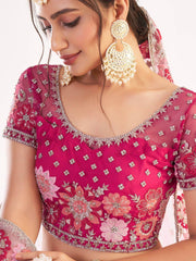 Magnificent Rani Pink Sequins Embroidered Net Wedding Wear Lehenga Choli