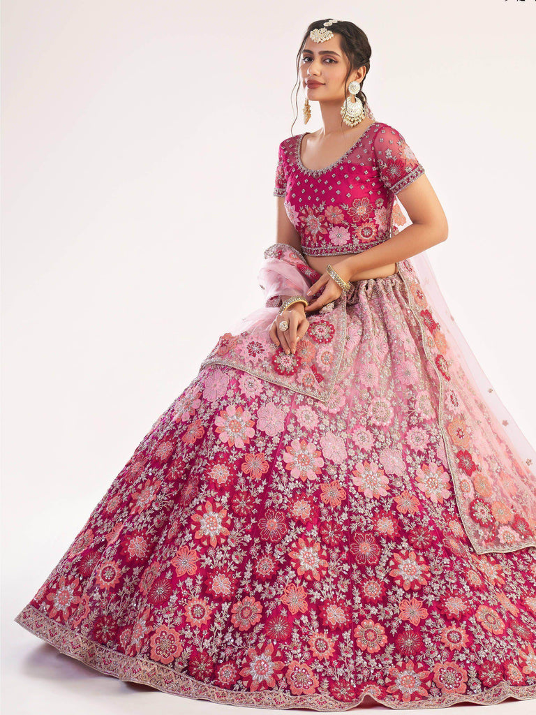 Magnificent Rani Pink Sequins Embroidered Net Wedding Wear Lehenga Choli