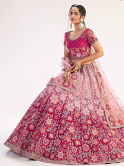 Magnificent Rani Pink Sequins Embroidered Net Wedding Wear Lehenga Choli