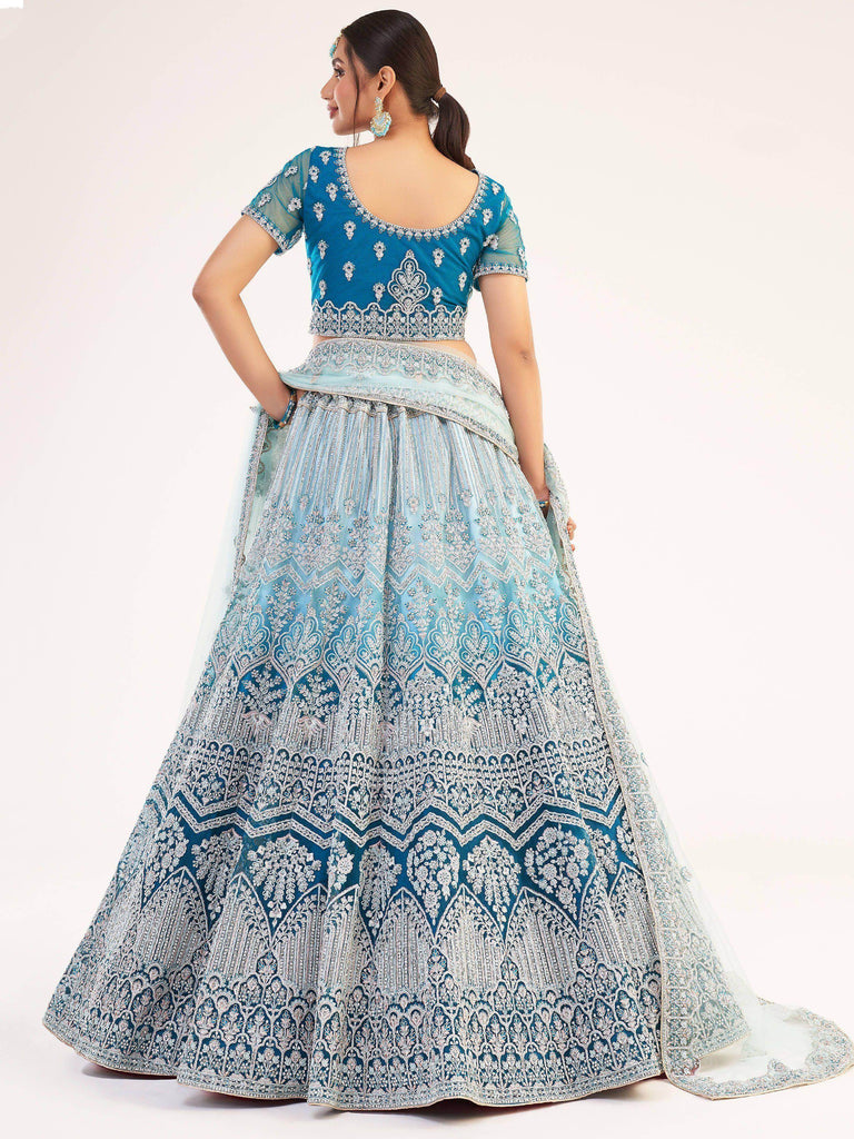 Glorious Teal Blue Sequins Embroidered Net Wedding Wear Lehenga Choli