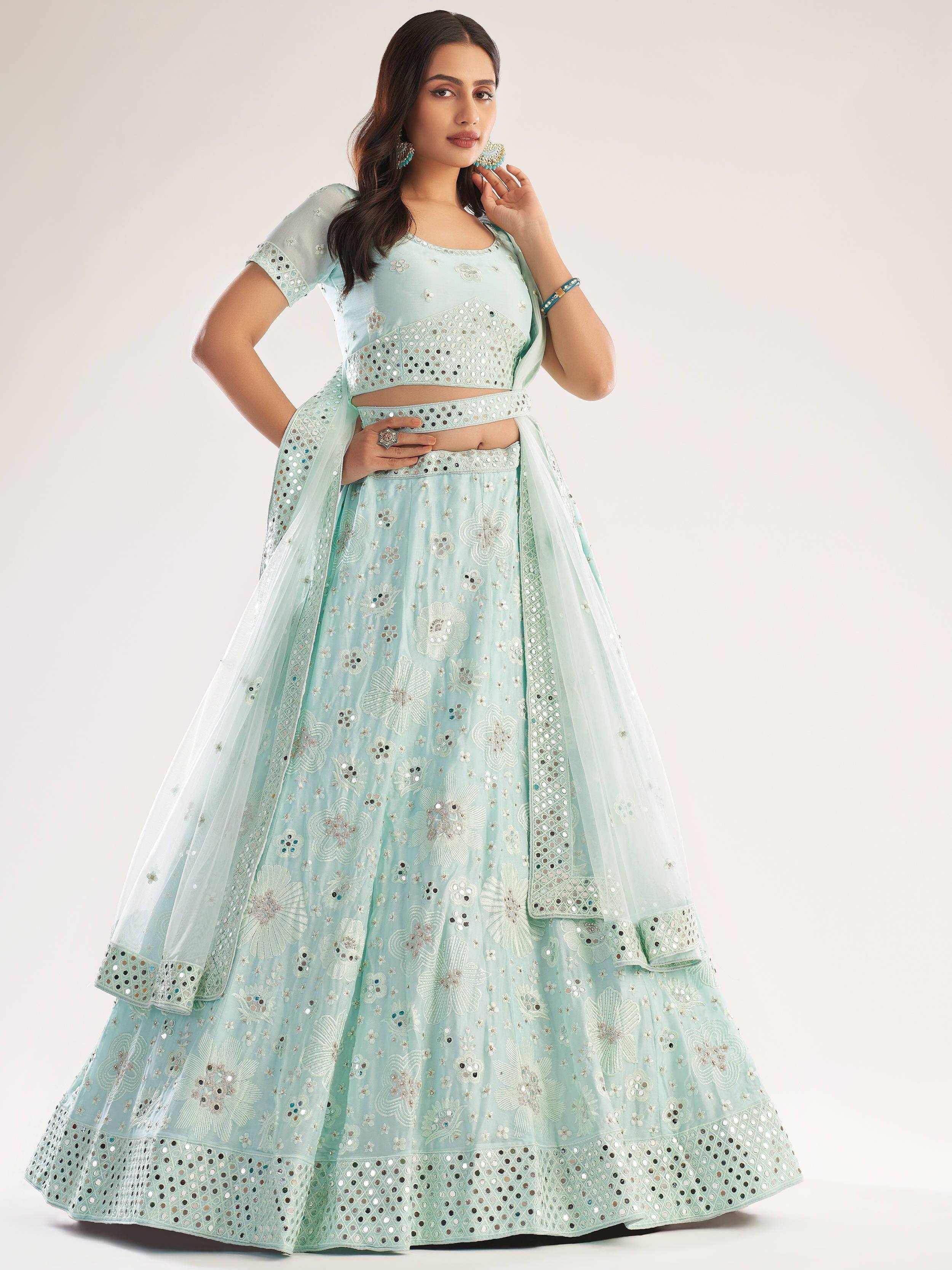 Mint green designer lehenga choli with mirror work and floral embroidery for Indian ethnic wear