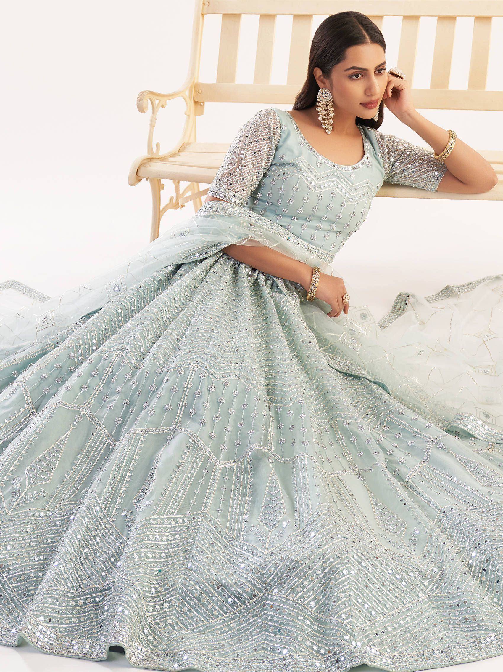 Mint green designer lehenga choli with heavy sequin and mirror work, perfect for weddings and festive occasions