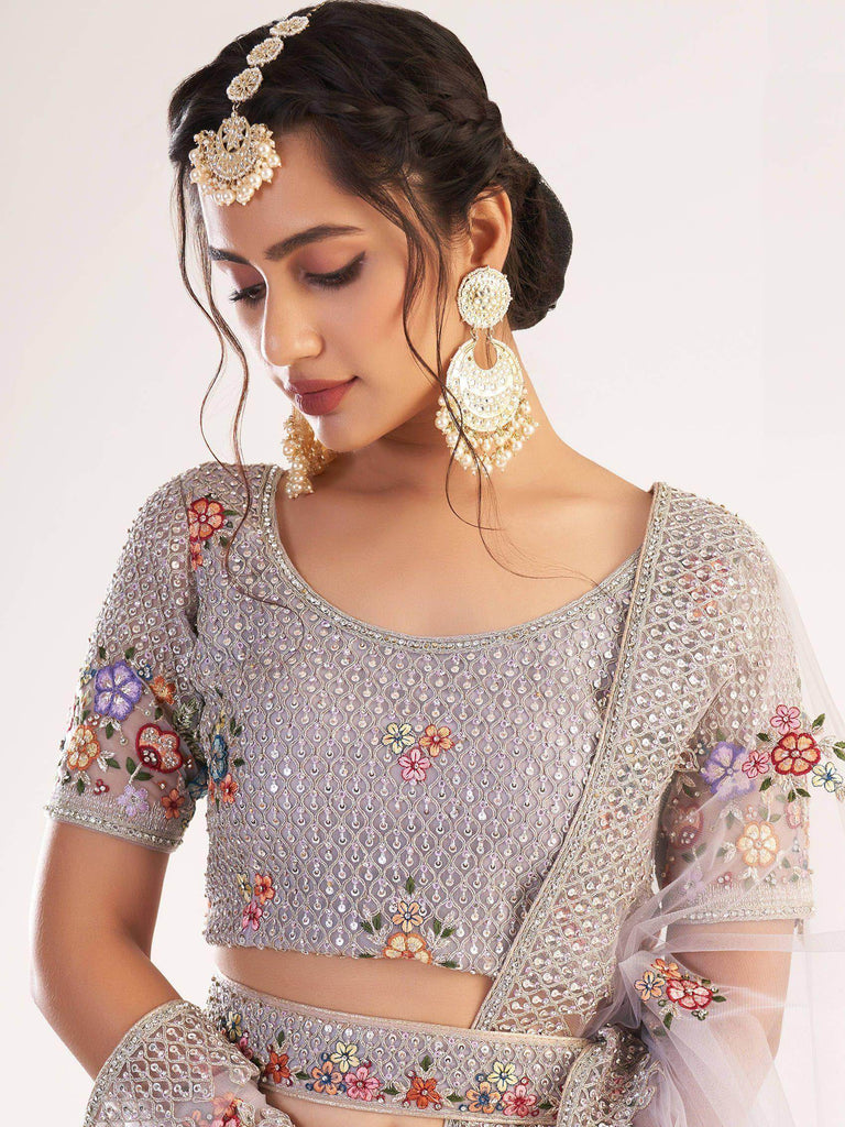 Astonishing Light Purple Sequins Embroidered Net Wedding Wear Lehenga Choli