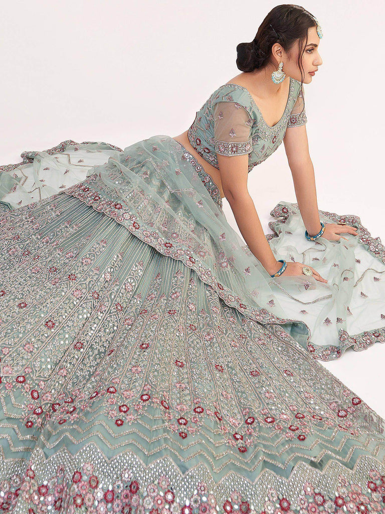 Remarkable Green Sequins Embroidered Net Wedding Wear Lehenga Choli