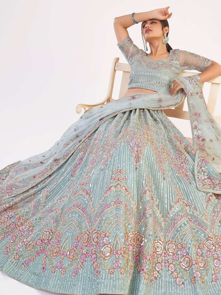 Unique Sky Blue Sequins Embroidered Net Wedding Wear Lehenga Choli