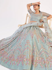 Unique Sky Blue Sequins Embroidered Net Wedding Wear Lehenga Choli