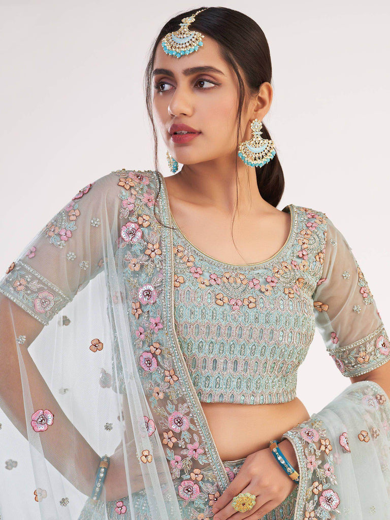 Unique Sky Blue Sequins Embroidered Net Wedding Wear Lehenga Choli