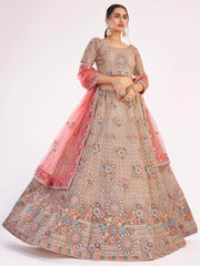 Impressive Gold Sequins Embroidered Net Wedding Wear Lehenga Choli