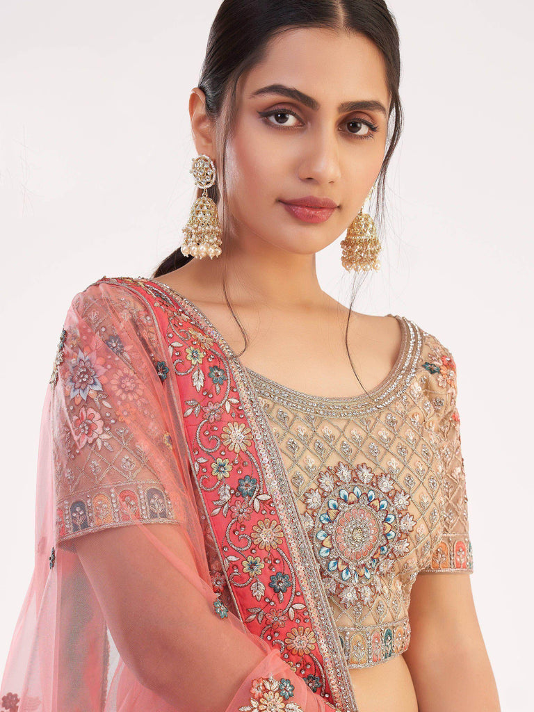 Impressive Gold Sequins Embroidered Net Wedding Wear Lehenga Choli