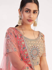 Impressive Gold Sequins Embroidered Net Wedding Wear Lehenga Choli