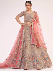 Impressive Gold Sequins Embroidered Net Wedding Wear Lehenga Choli