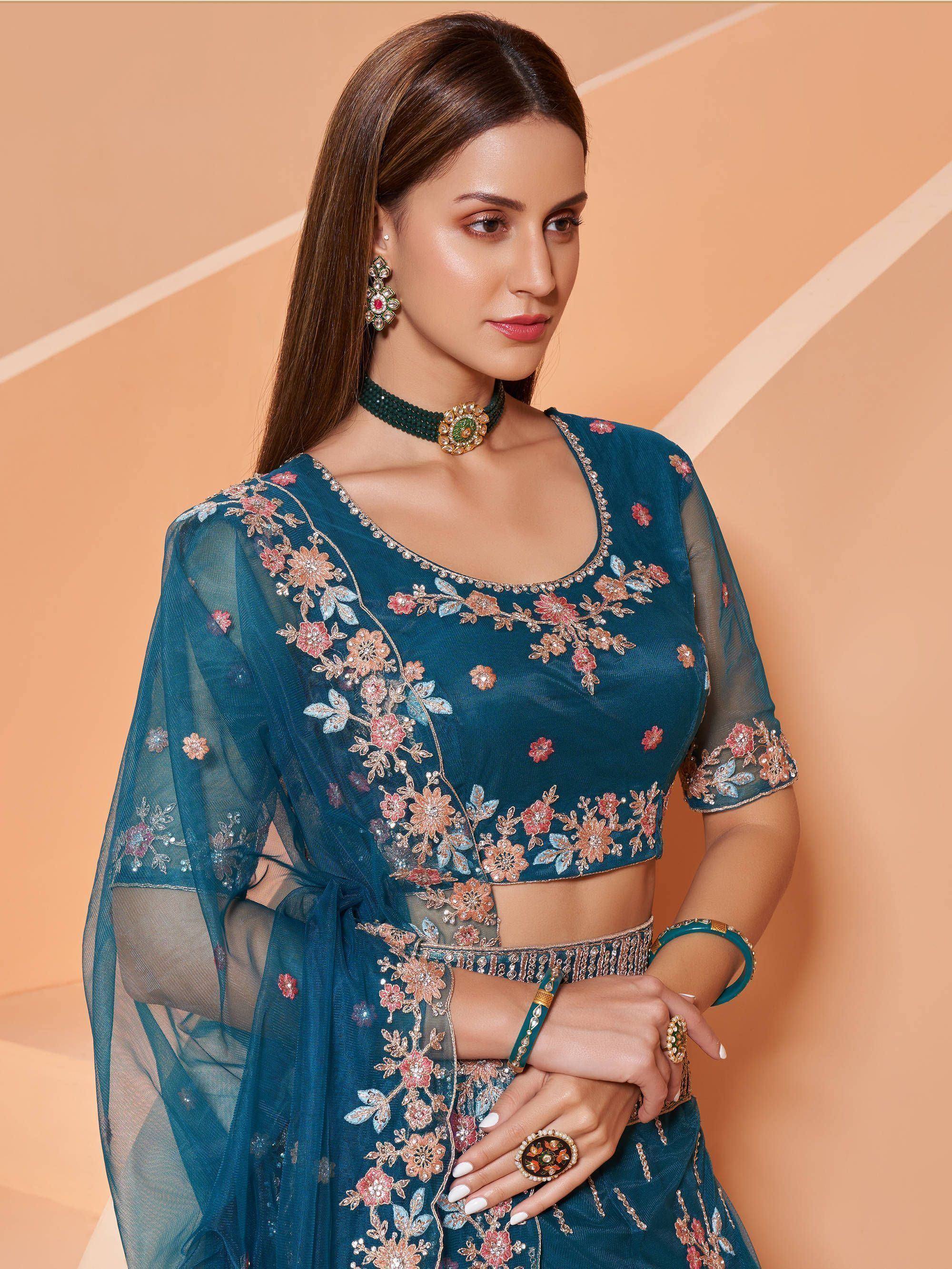 Teal floral embroidered lehenga choli with sheer sleeves, perfect for Indian ethnic wear occasions