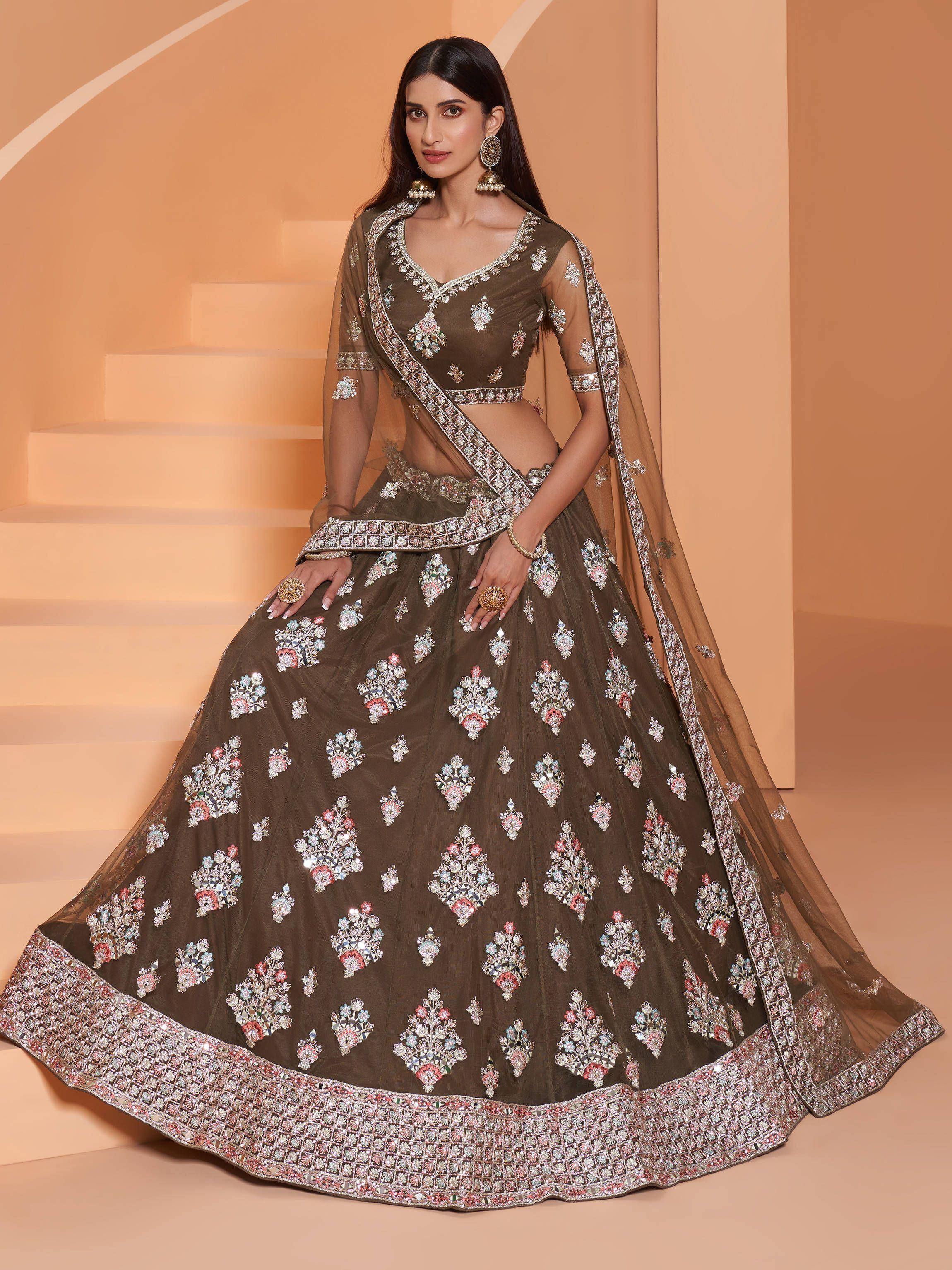 Elegant olive green lehenga choli with floral mirror work, perfect for Indian weddings and festive occasions.