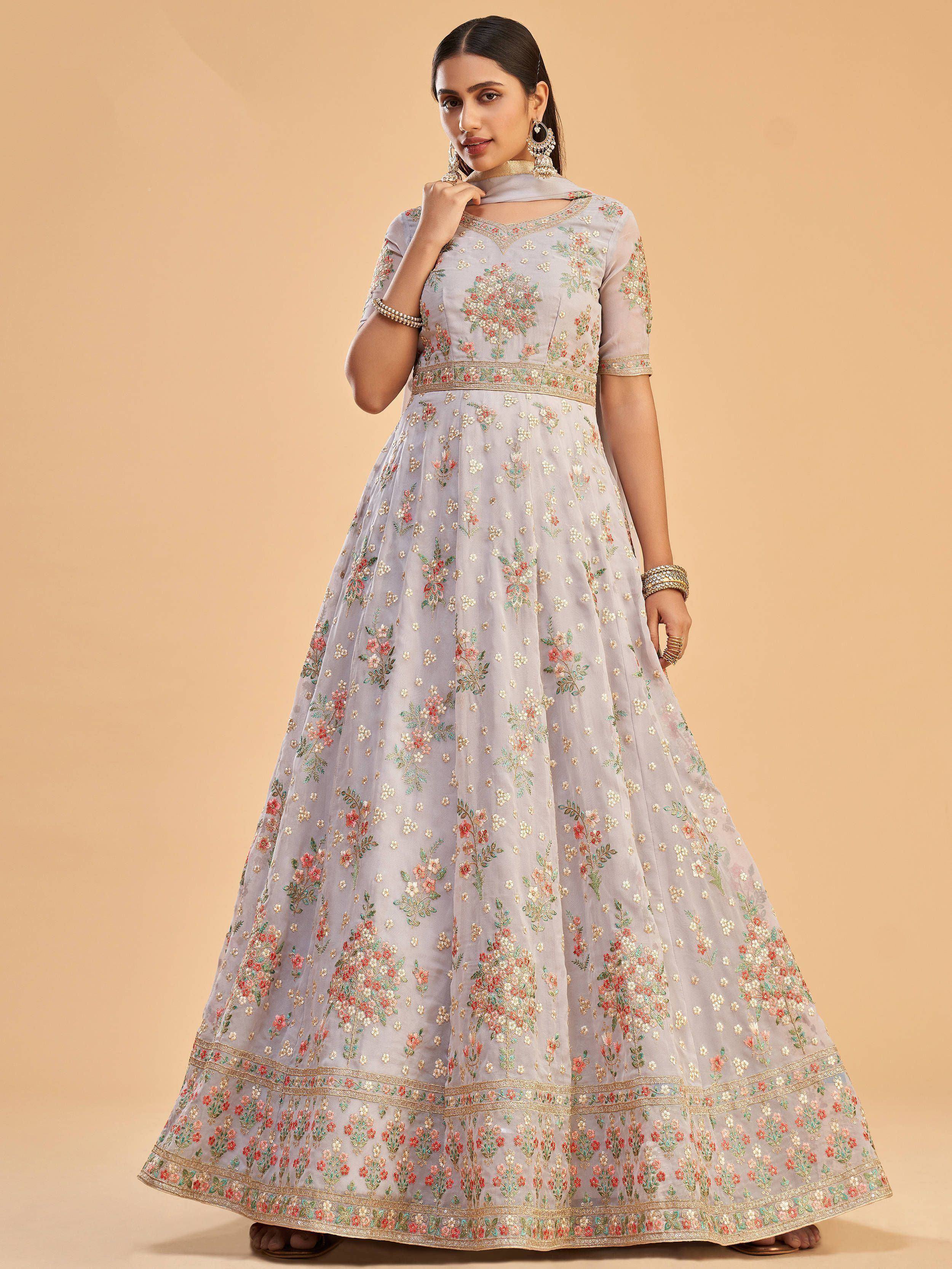 Elegant grey floral embroidered anarkali gown with gold detailing, perfect for Indian ethnic occasions.