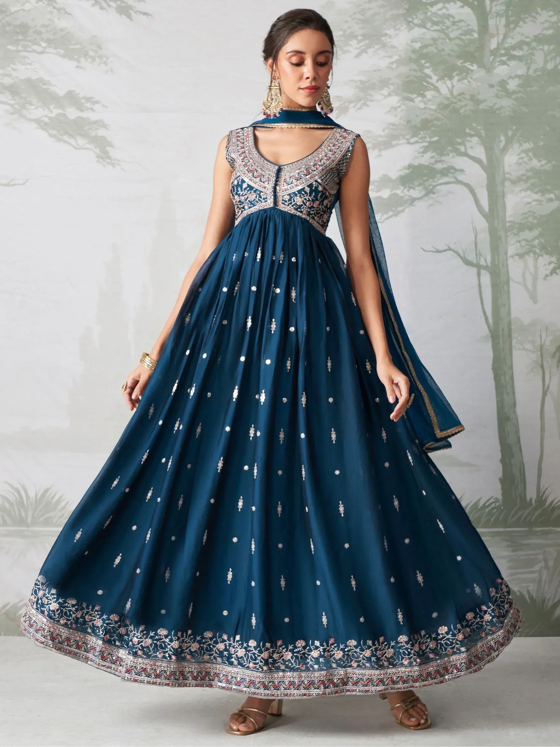 Blue embroidered anarkali gown with floral motifs and dupatta, perfect for Indian ethnic occasions