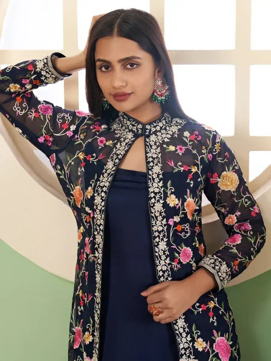 Floral embroidered navy blue kurta with sheer sleeves, styled with statement earrings for ethnic wear