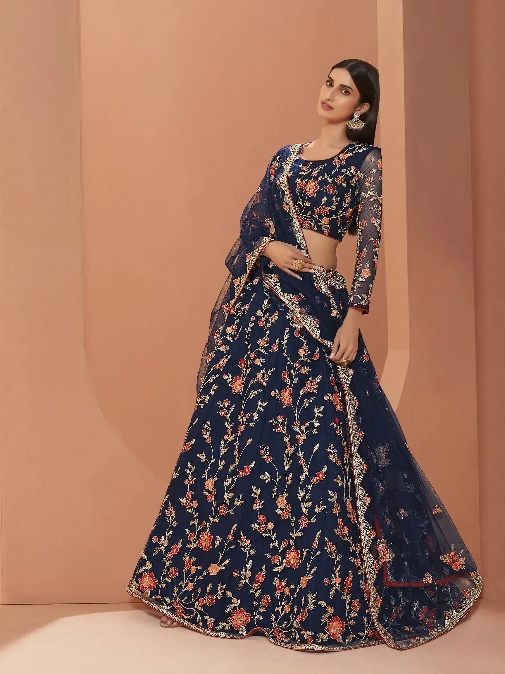 Navy blue floral embroidered lehenga choli with sheer sleeves and dupatta, perfect for Indian ethnic occasions