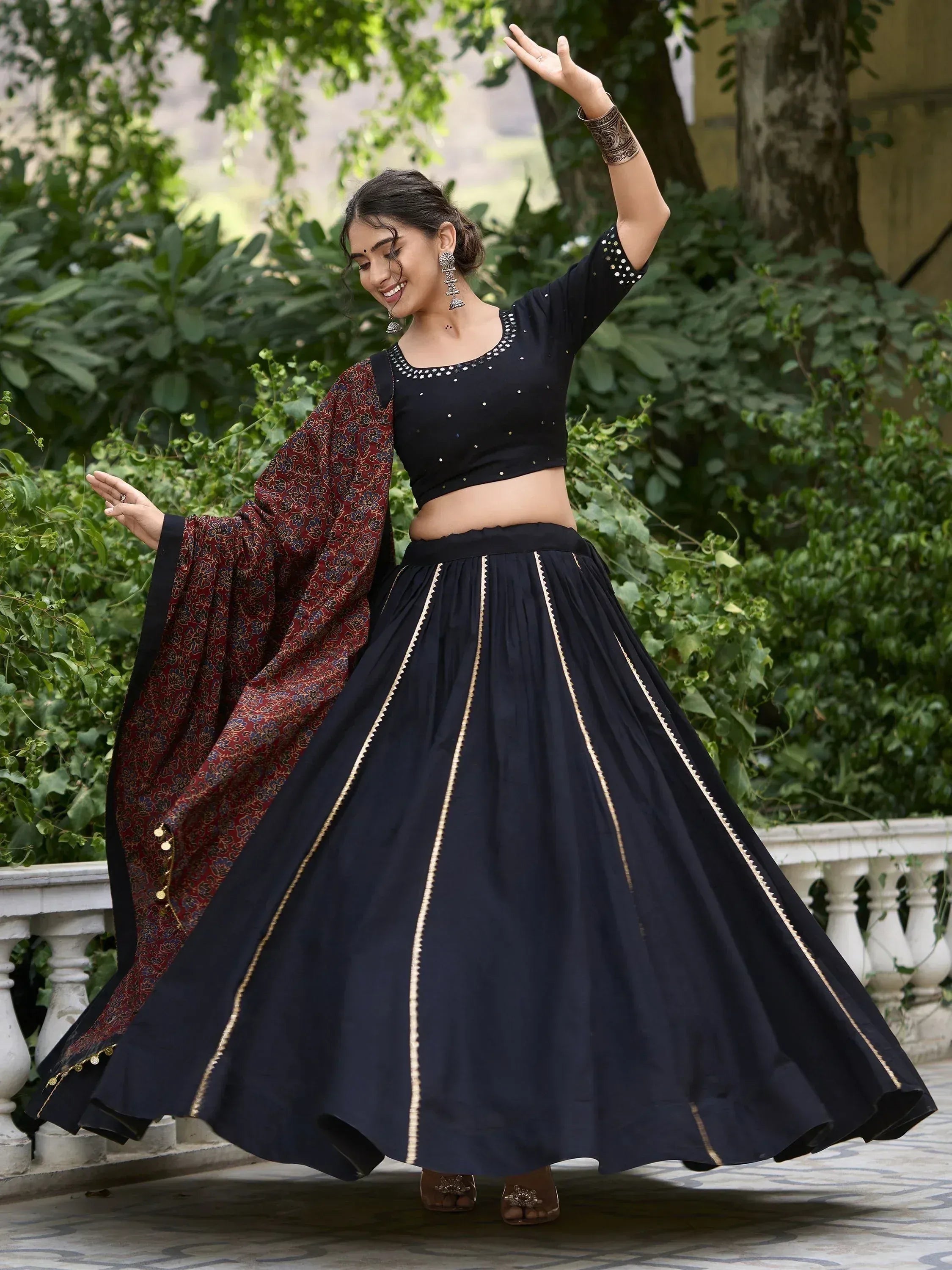 Black lehenga choli with gold trim and maroon dupatta, Indian ethnic wear for women