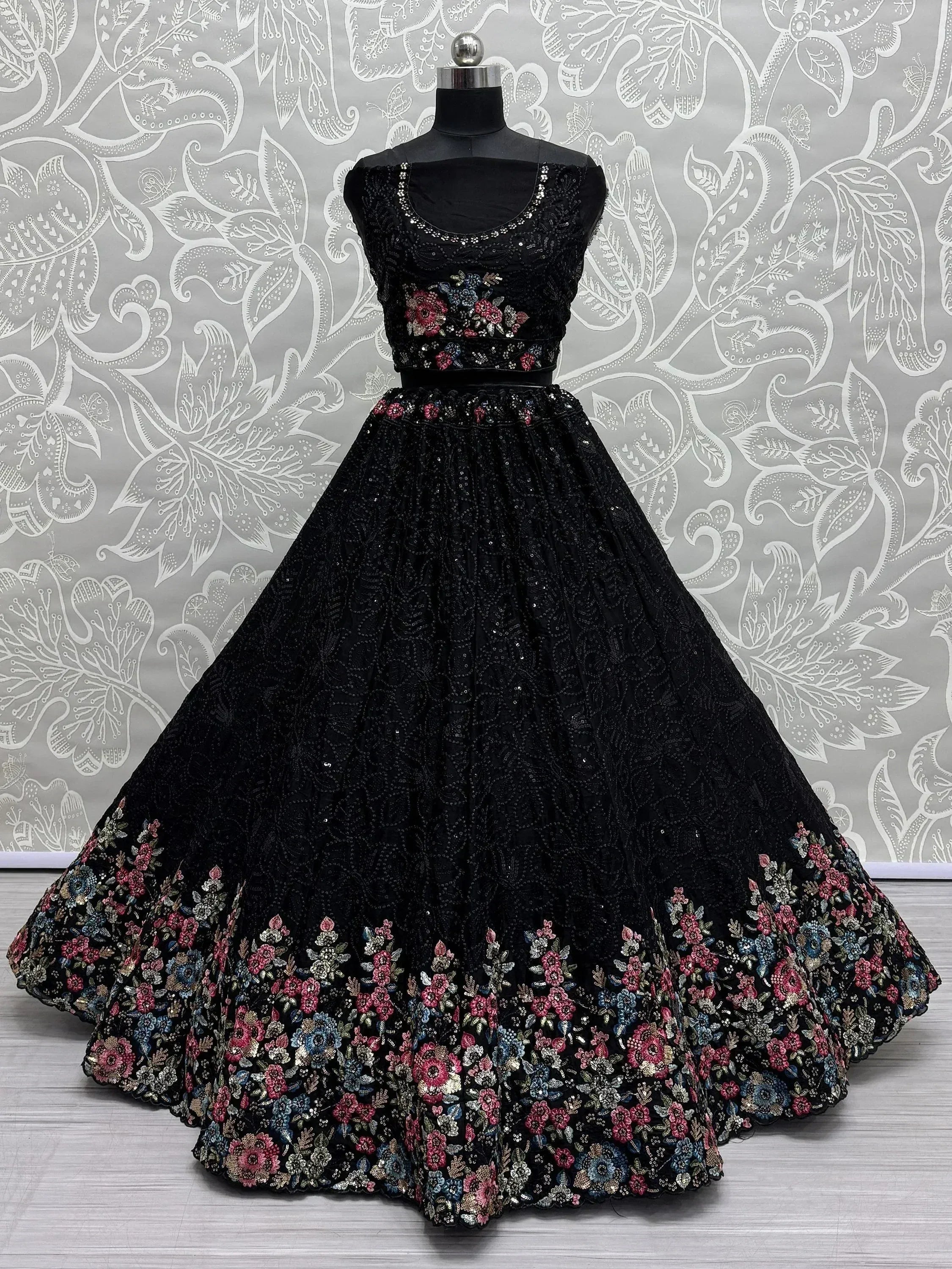 Black floral embroidered lehenga choli with sequin detailing, perfect for Indian ethnic occasions