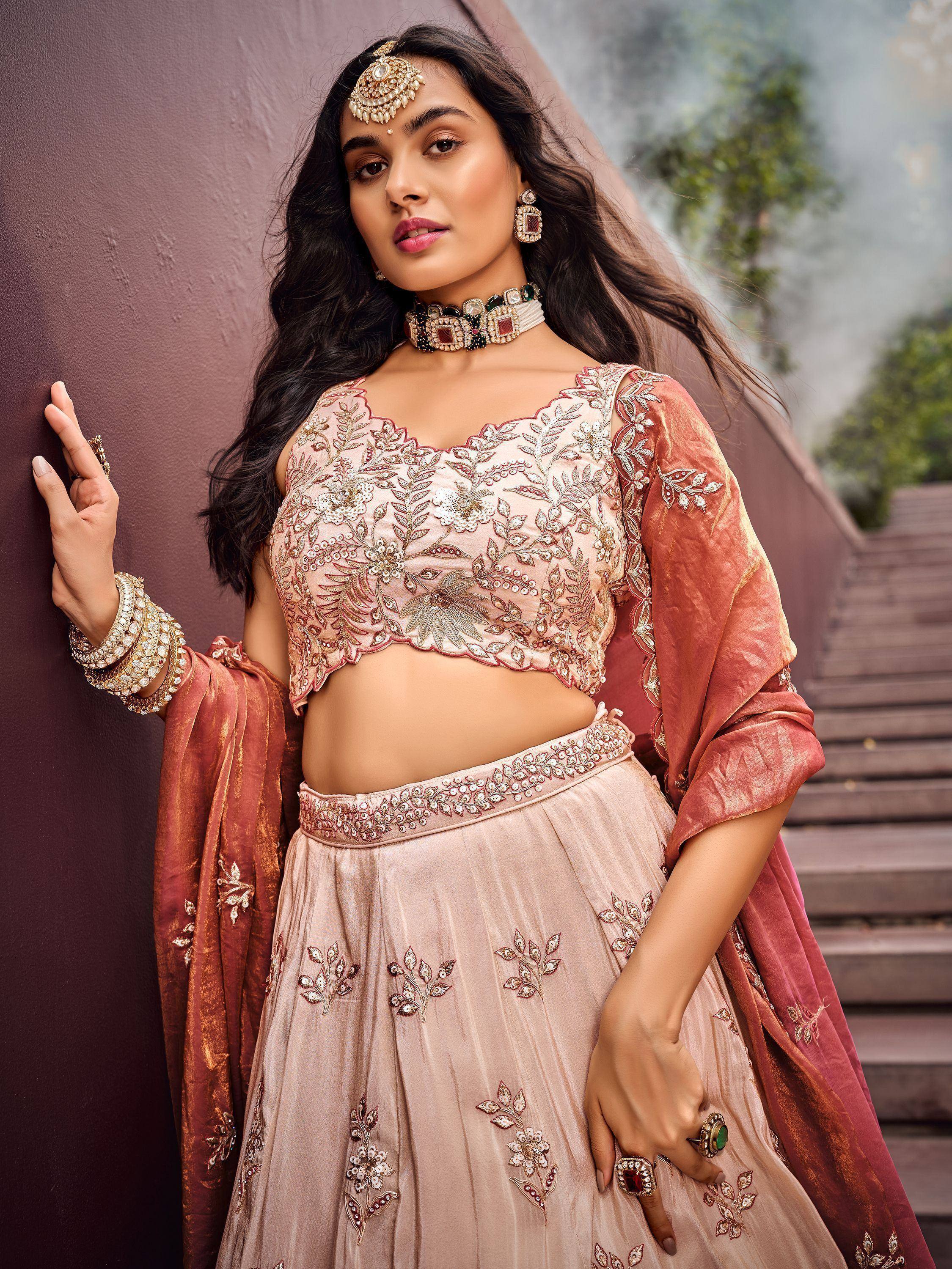 Elegant Indian lehenga choli with floral embroidery, perfect for weddings and festive occasions.