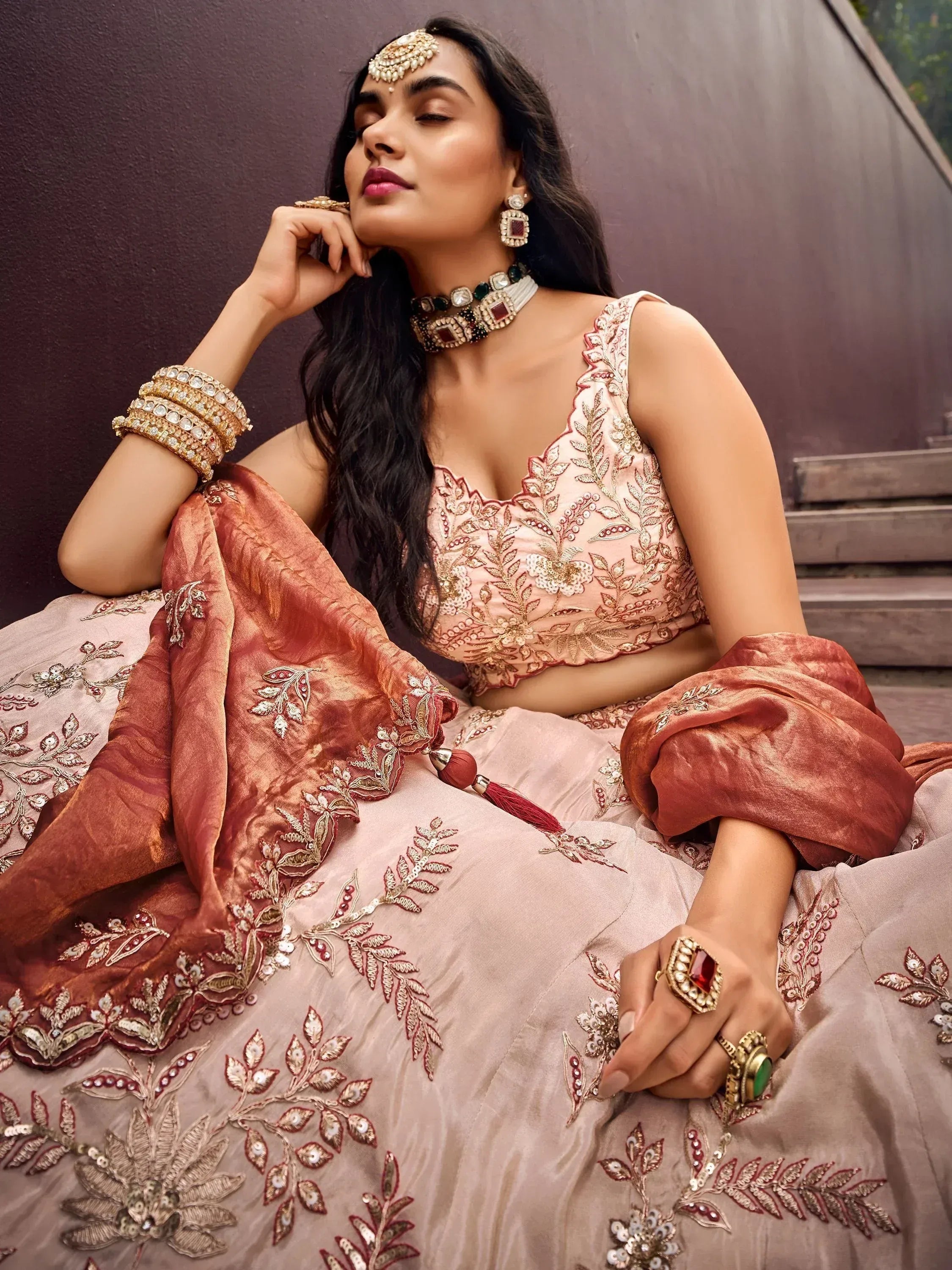 Elegant Indian lehenga choli with intricate floral embroidery, perfect for weddings and festive occasions.