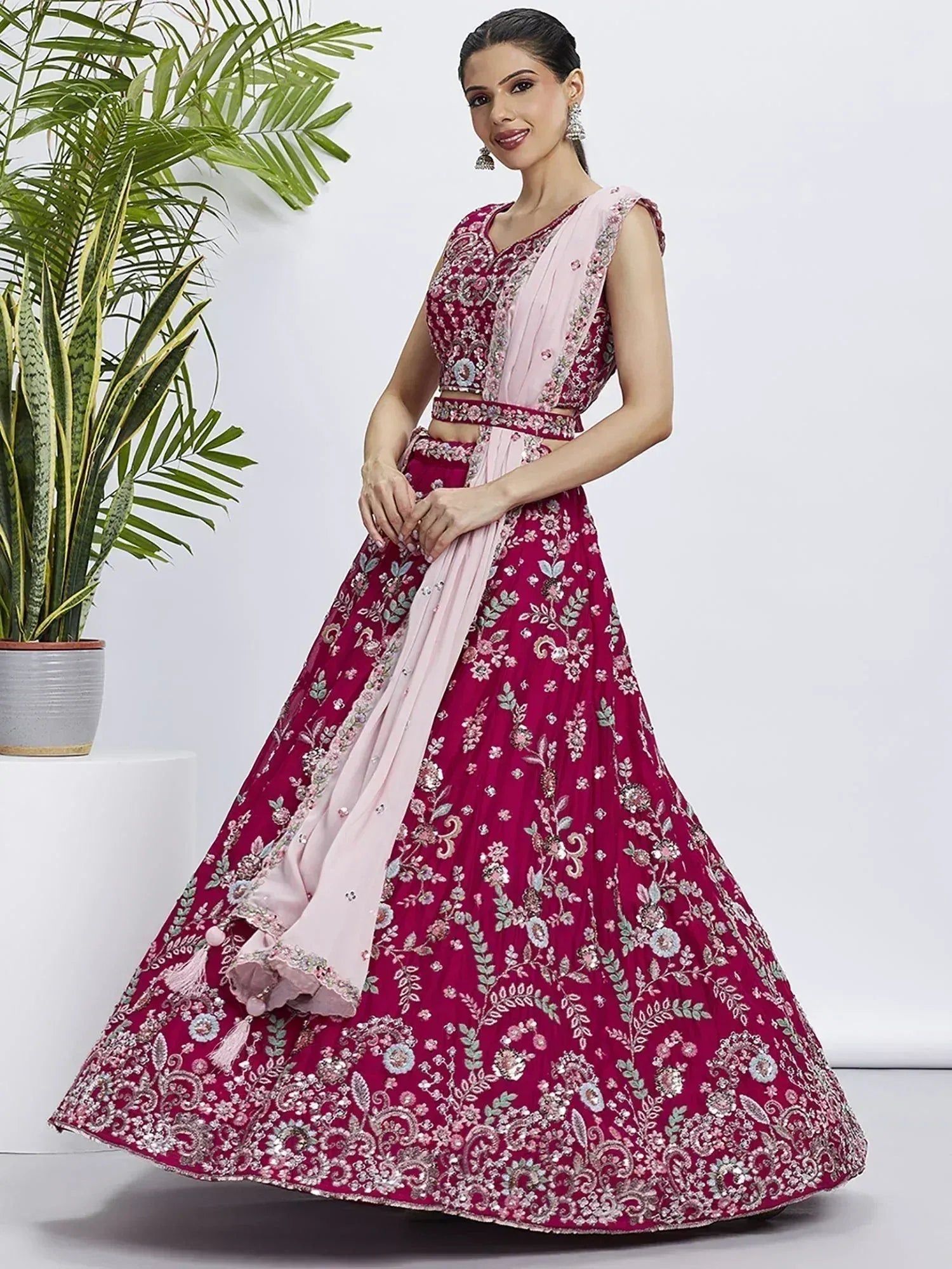 Elegant maroon lehenga choli with floral embroidery and pink dupatta for Indian ethnic wear
