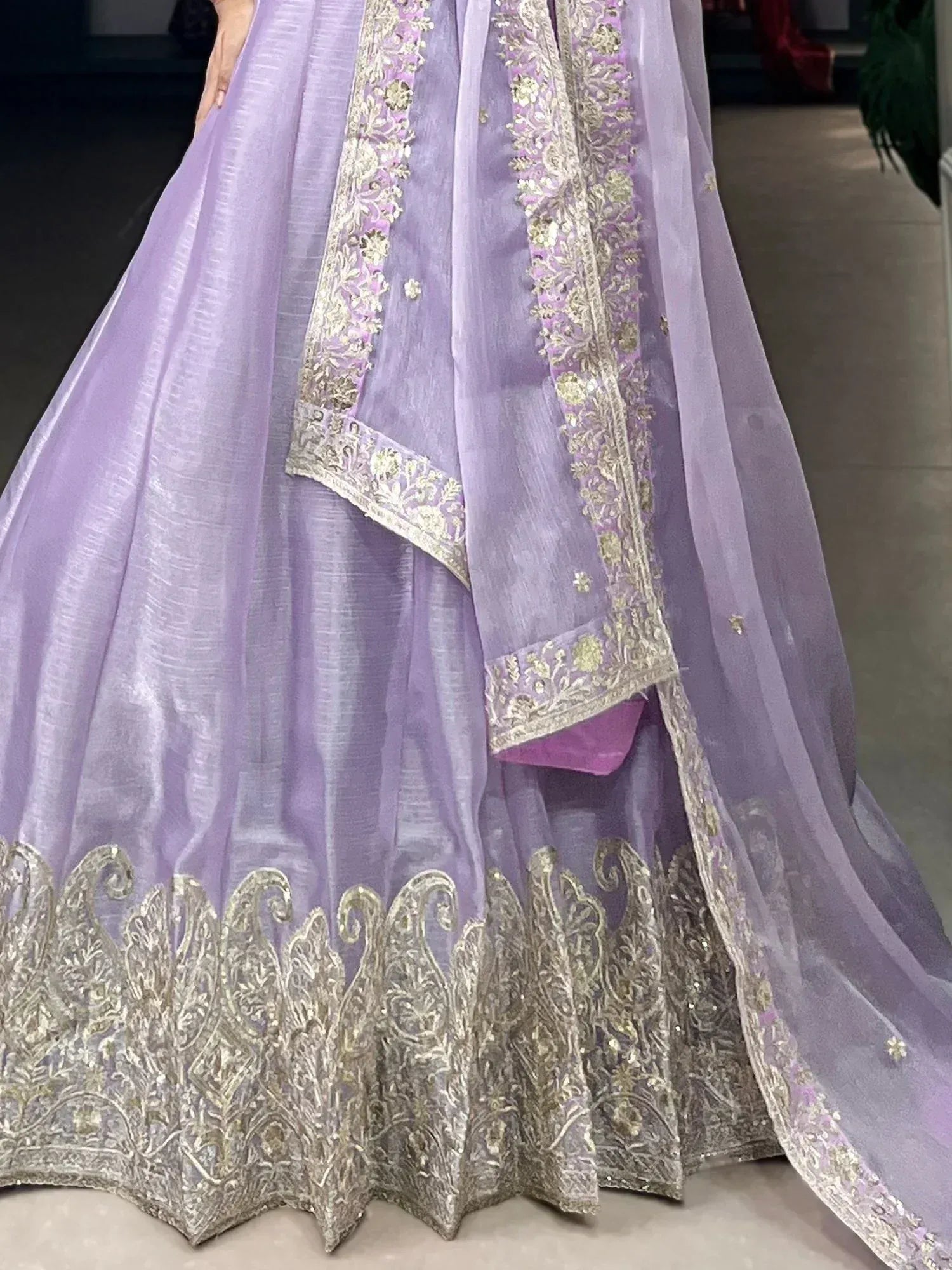 Lavender lehenga choli with gold embroidery, perfect for Indian ethnic wear and festive occasions.