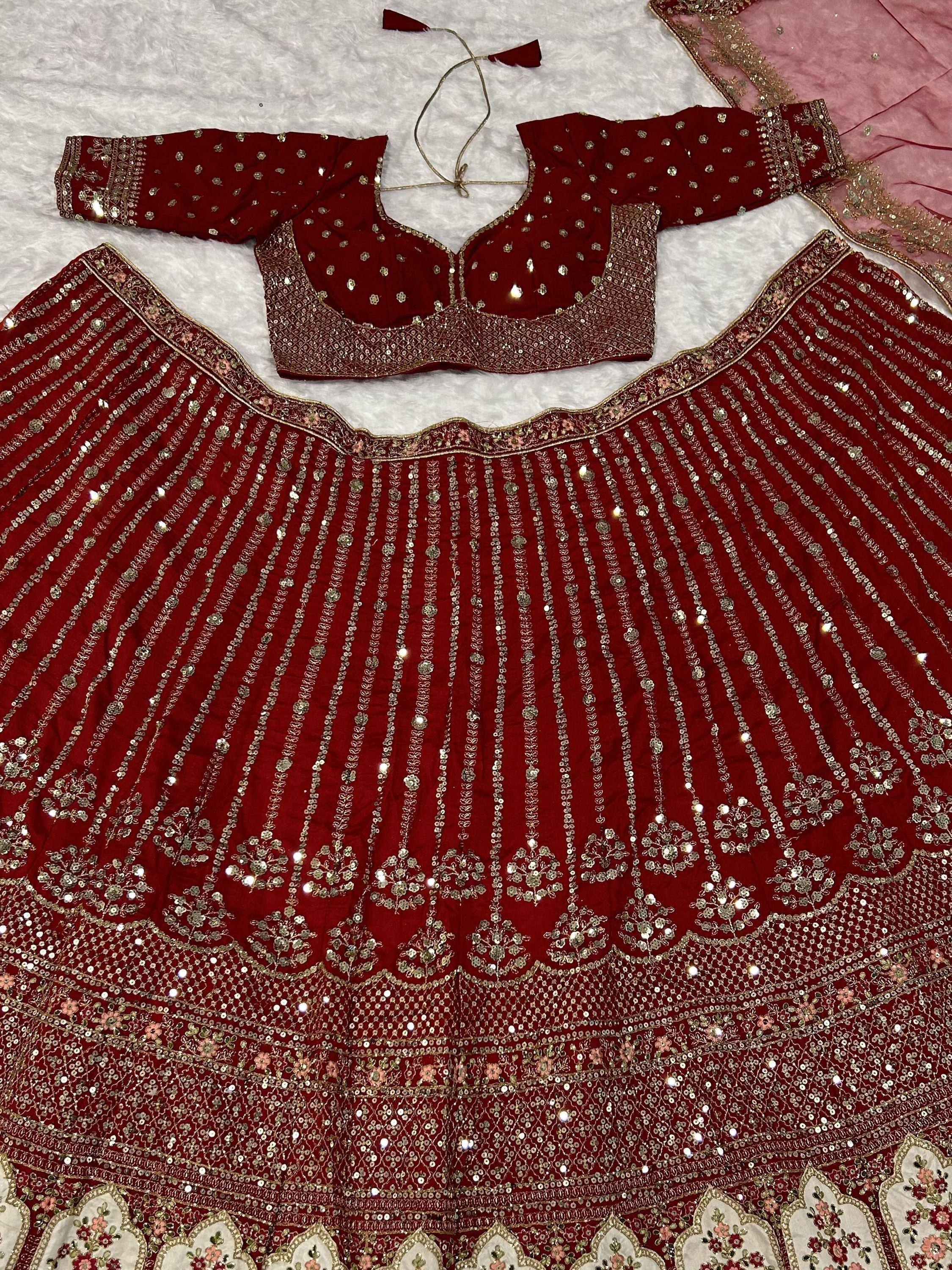 Red velvet lehenga choli with gold sequin embroidery, perfect for Indian weddings and festive occasions.