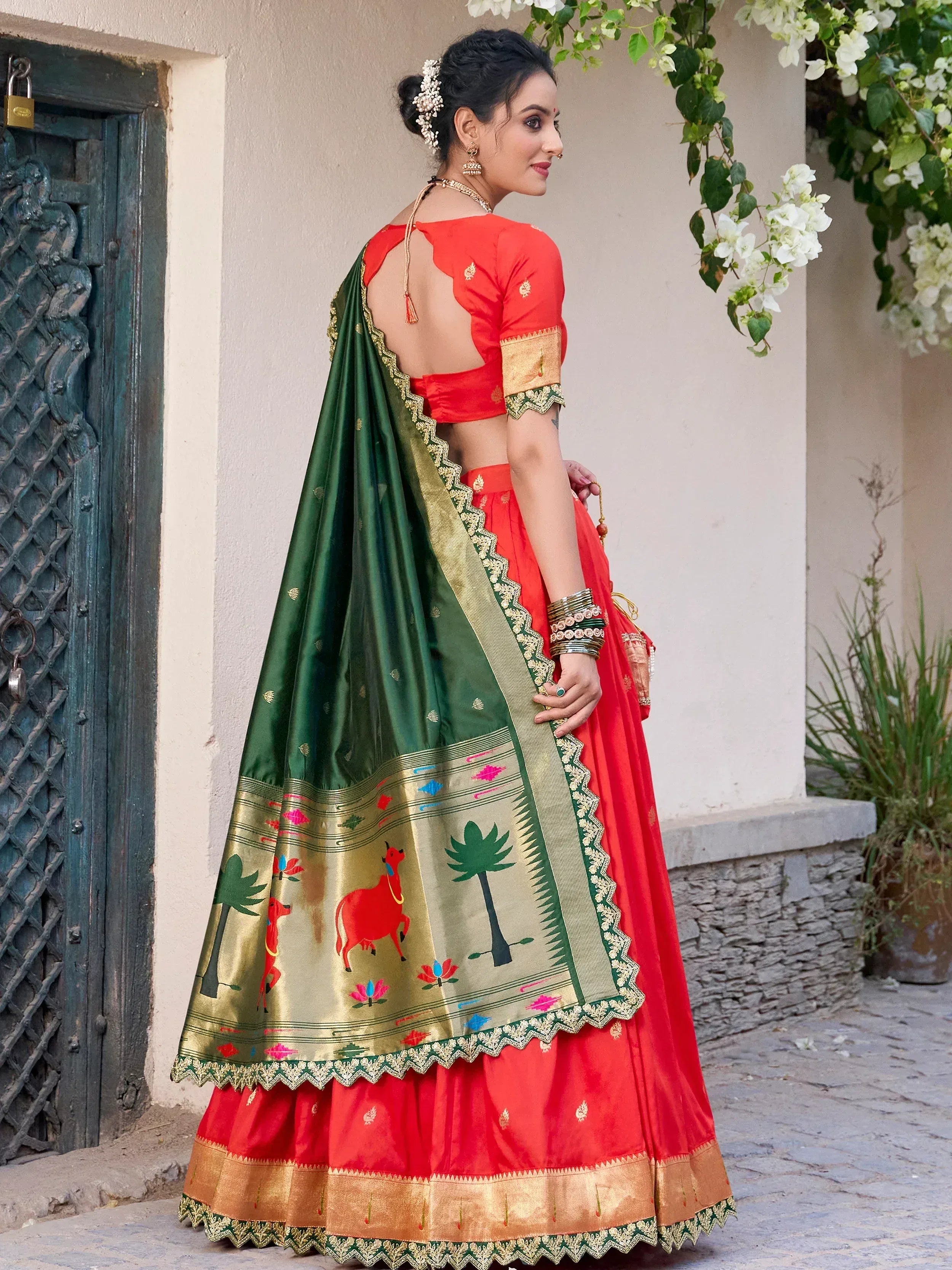 Red and green designer lehenga choli with embroidered dupatta, perfect for Indian ethnic wear occasions