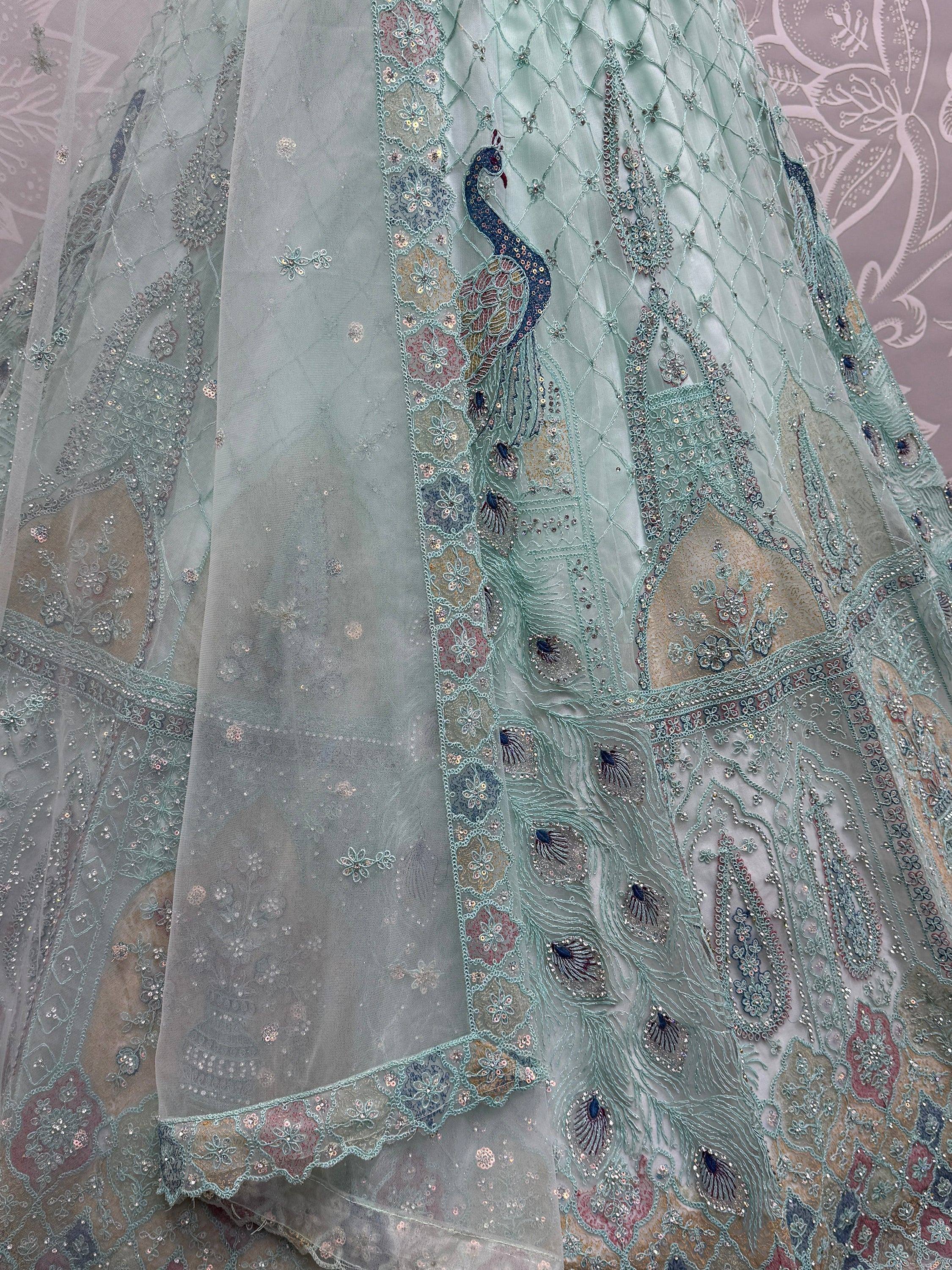 Mint green designer lehenga with peacock embroidery and sequin work, ethnic Indian wear