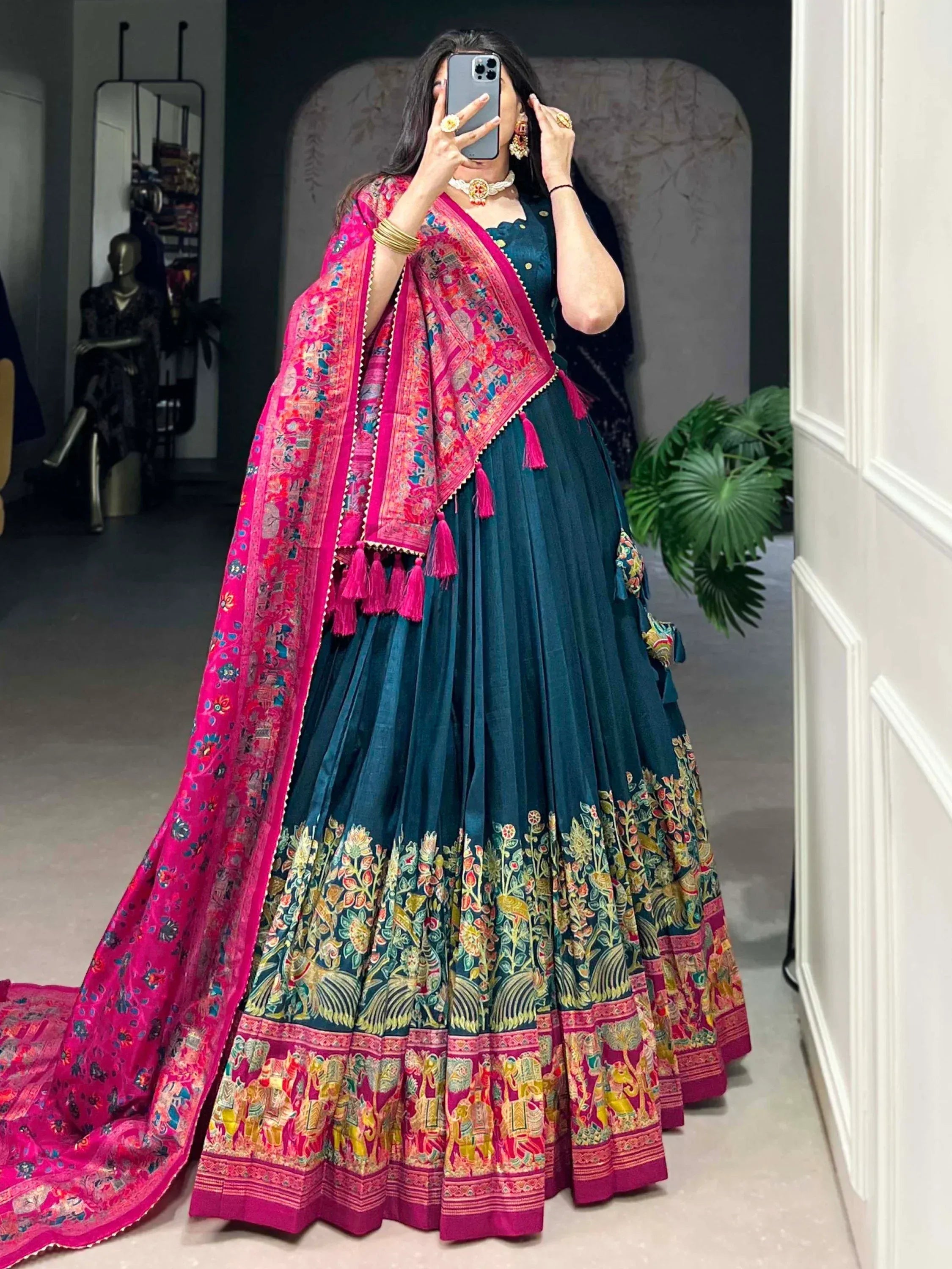 Teal lehenga choli with pink floral dupatta, ethnic Indian wear for weddings and festivals