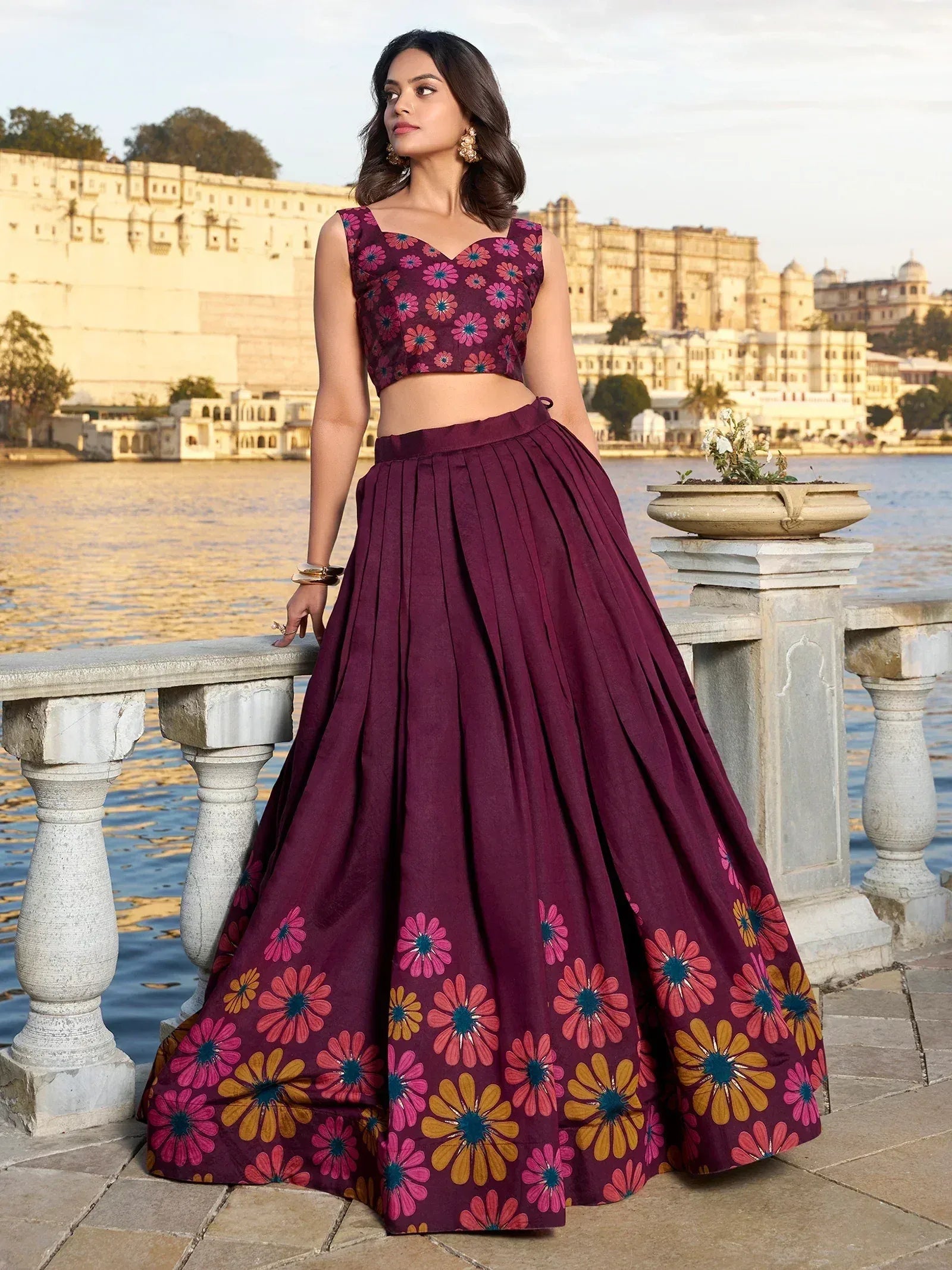 Purple floral lehenga choli with pleated skirt, perfect for Indian ethnic wear and festive occasions