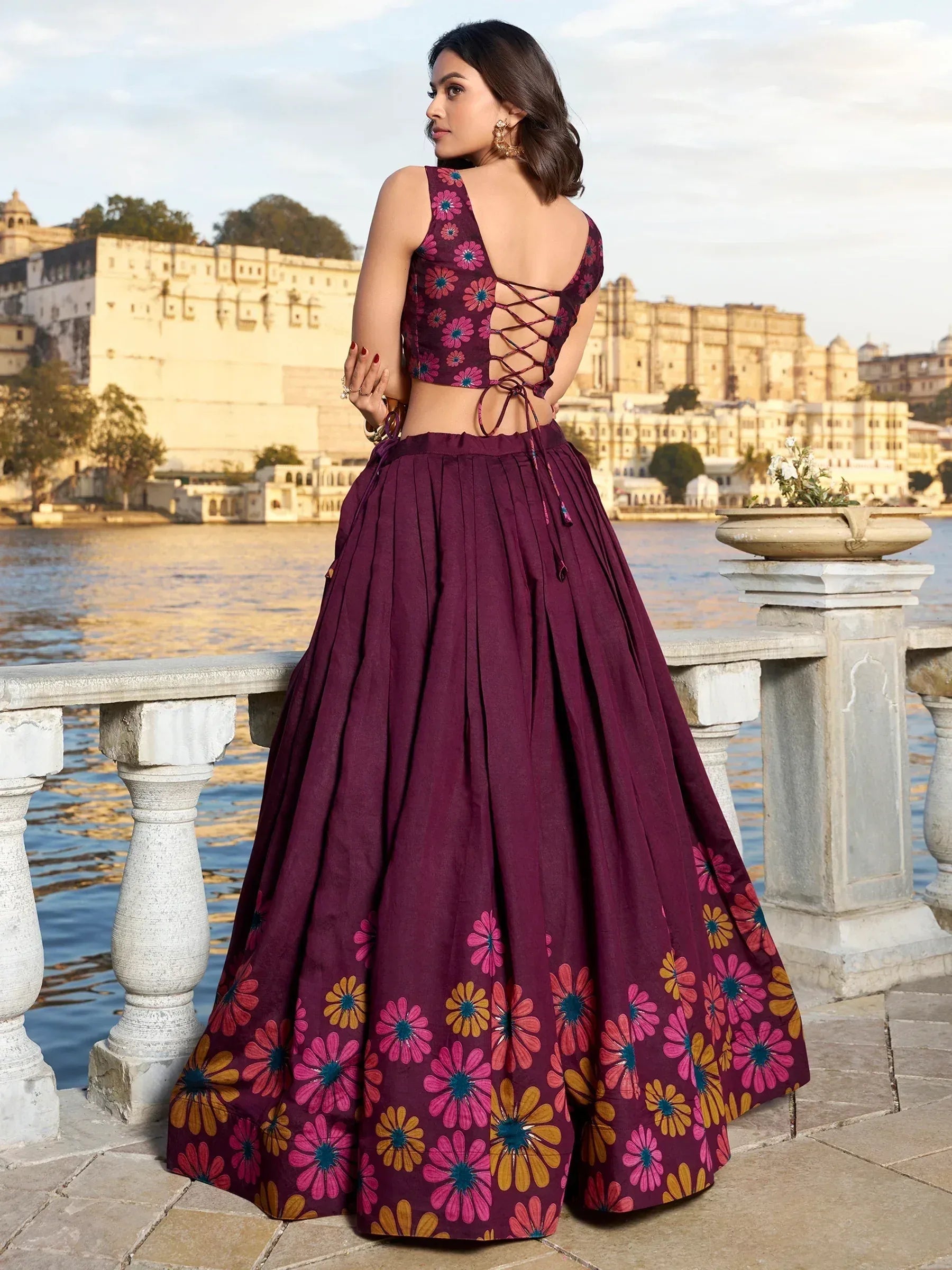 Purple floral lehenga choli with back lace-up design, perfect for Indian ethnic occasions
