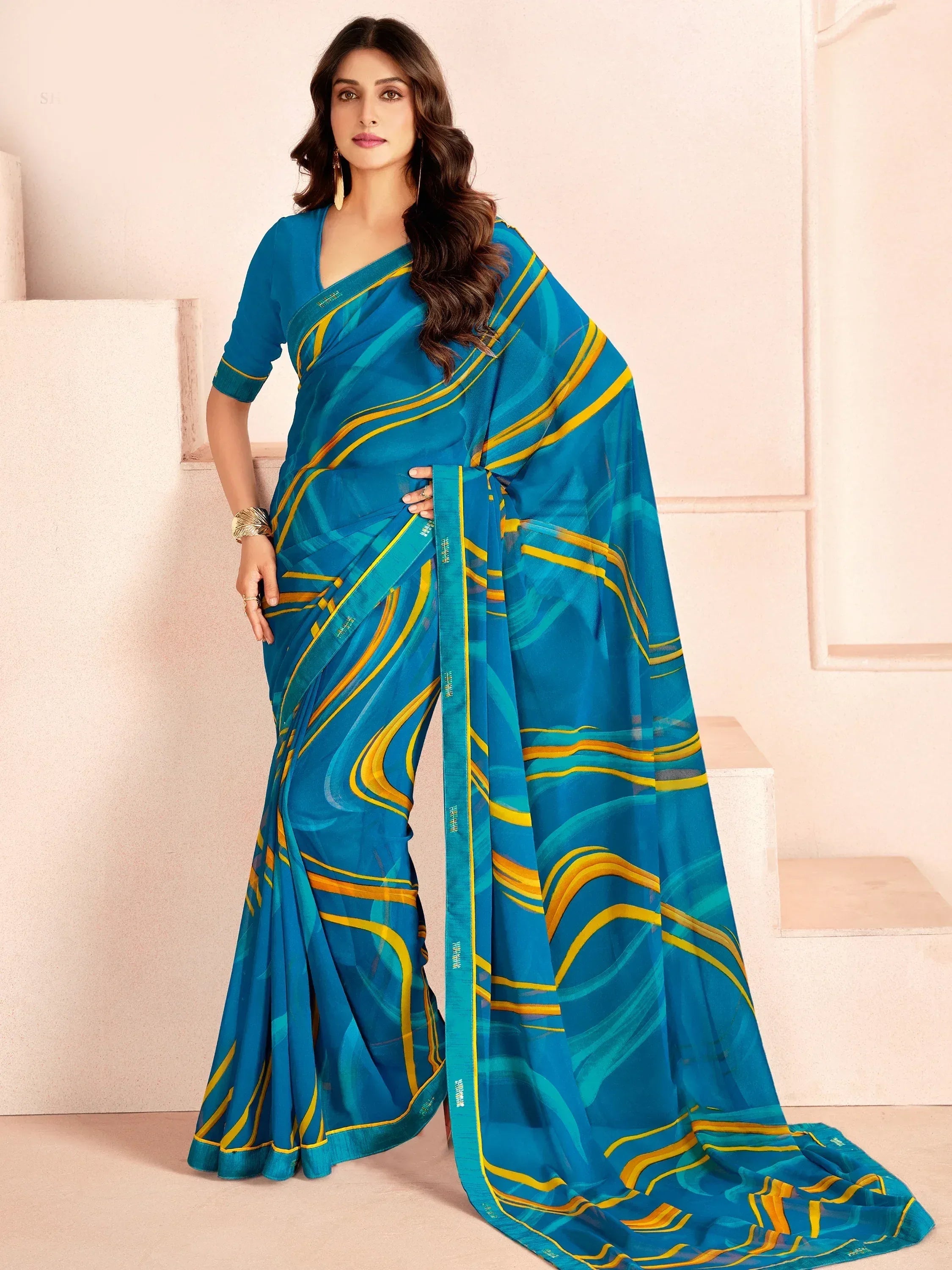 Blue and yellow printed saree with matching blouse, stylish ethnic wear for women