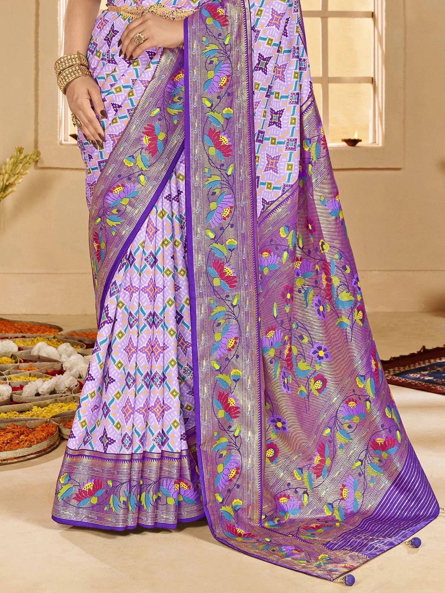 Purple floral print saree with geometric border, ethnic Indian wear for festive occasions