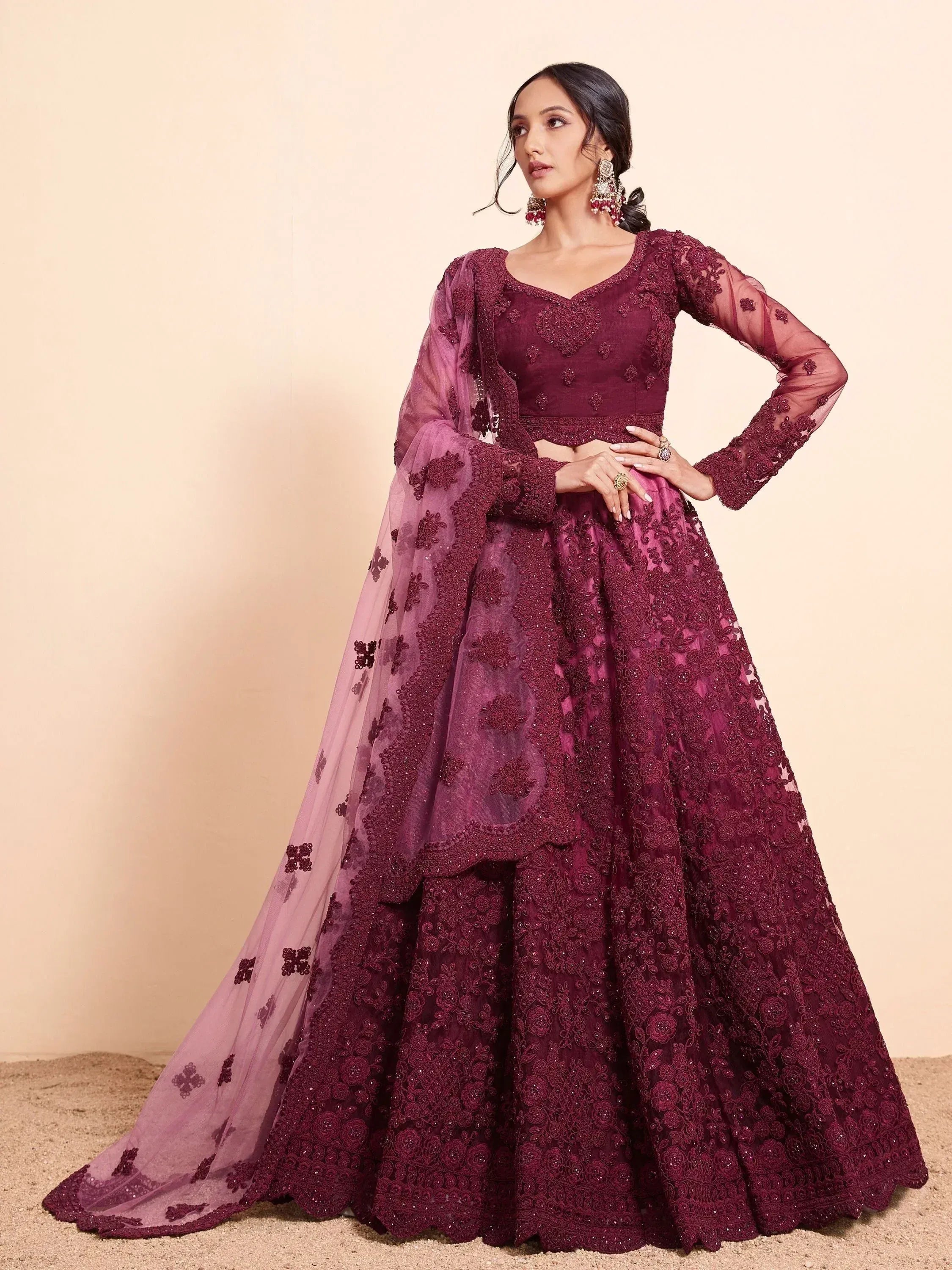 Elegant maroon designer lehenga choli with intricate floral embroidery and sheer dupatta for Indian ethnic wear