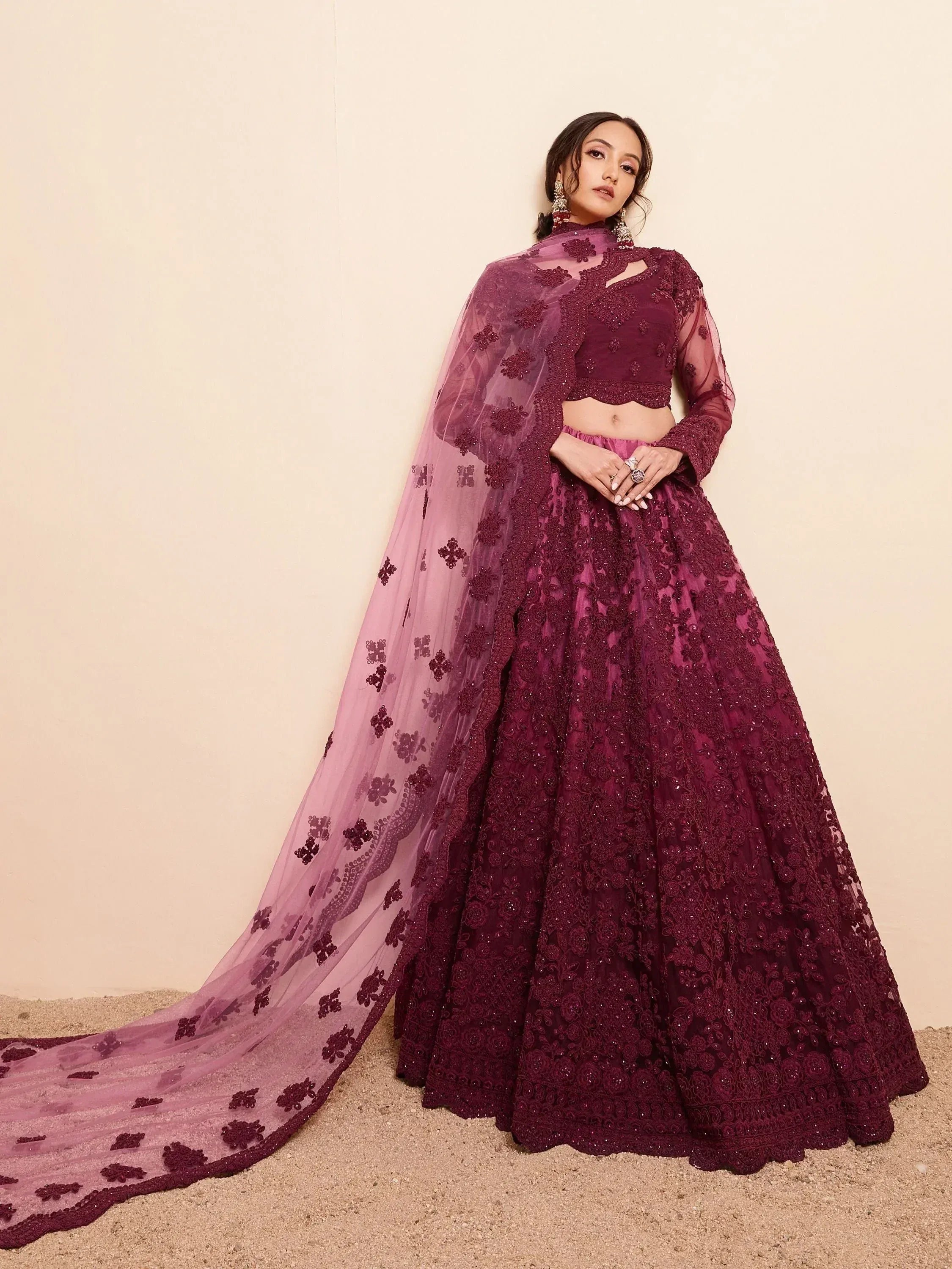 Elegant maroon designer lehenga choli with floral embroidery and sheer dupatta for Indian ethnic wear