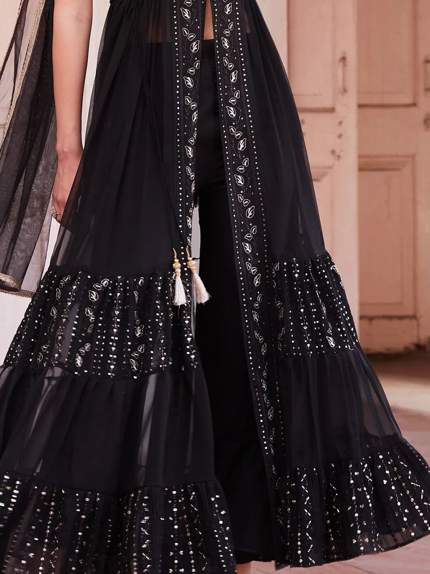 Black embroidered ethnic gown with sequin details and net dupatta