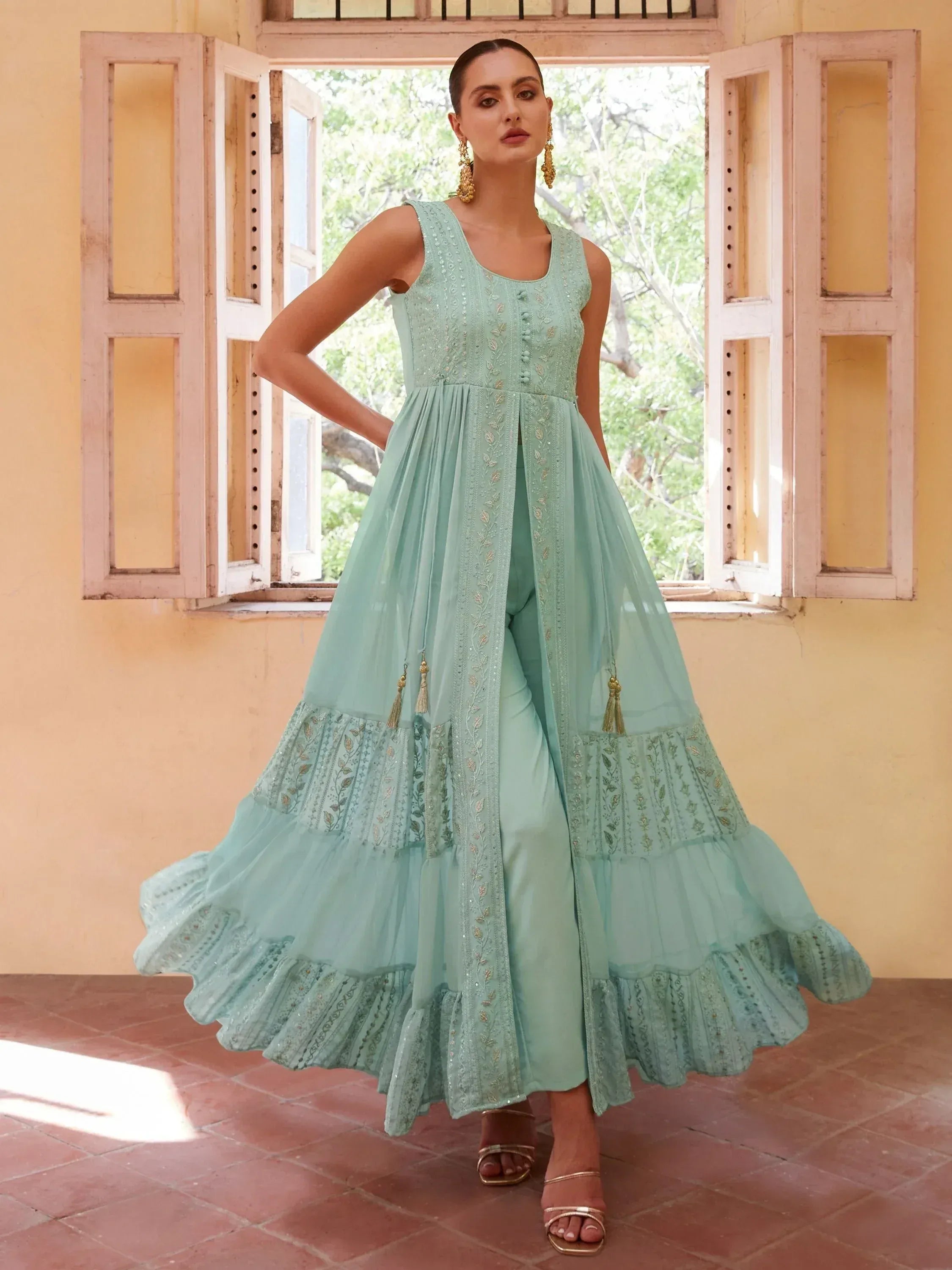 Mint green embroidered ethnic gown with palazzo pants, perfect for Indian occasions and festive wear.