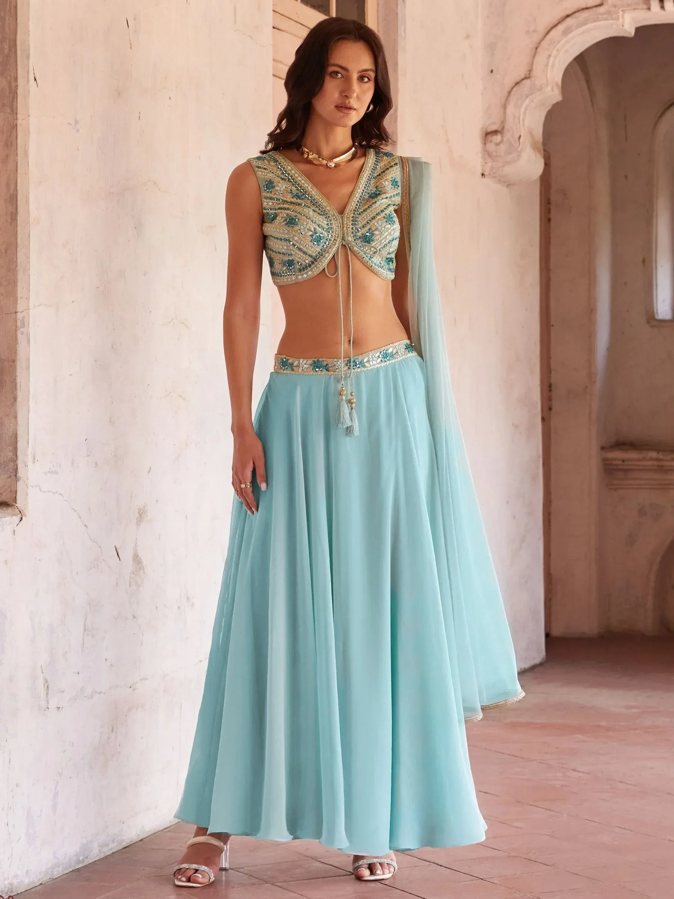 Light blue embroidered lehenga choli with sheer dupatta, perfect for Indian ethnic wear events