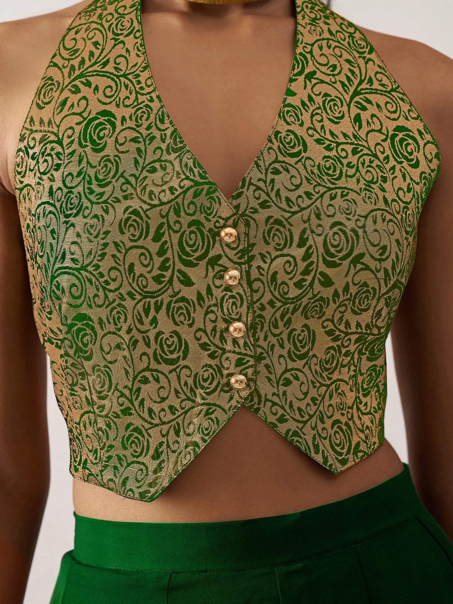 Green and gold floral print halter neck crop top with gold buttons, ethnic wear